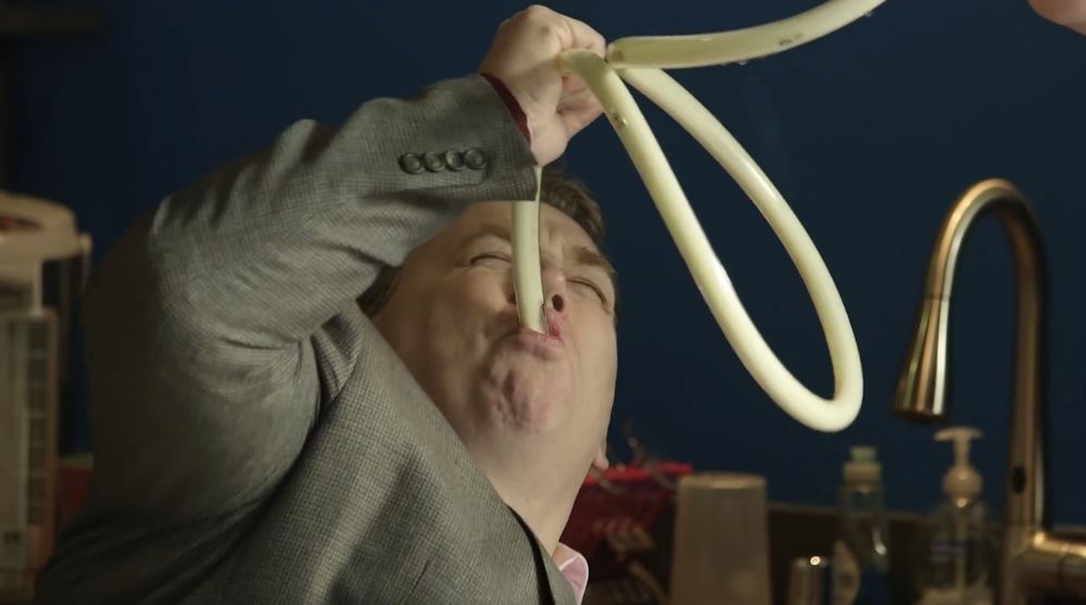 Mike Toole drinks eggnog from a siphon, much like "a pipeline of anime content", in the "Crunchyroll Holiday Special feat. Mike Toole" (2017)