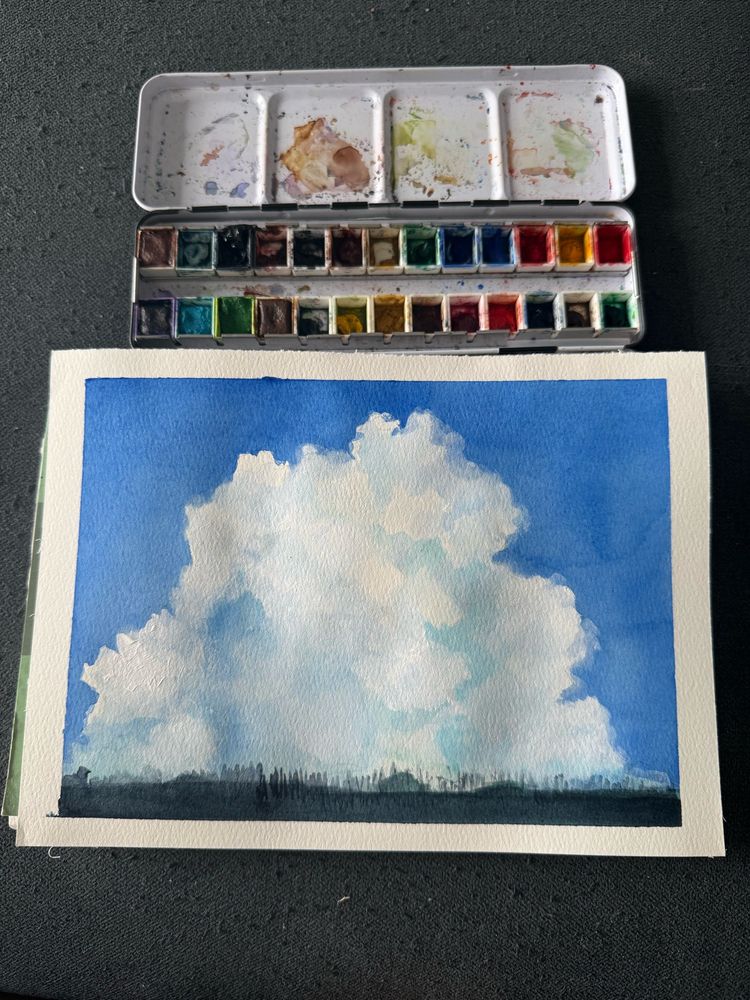 Painting of blue sky and clouds 
