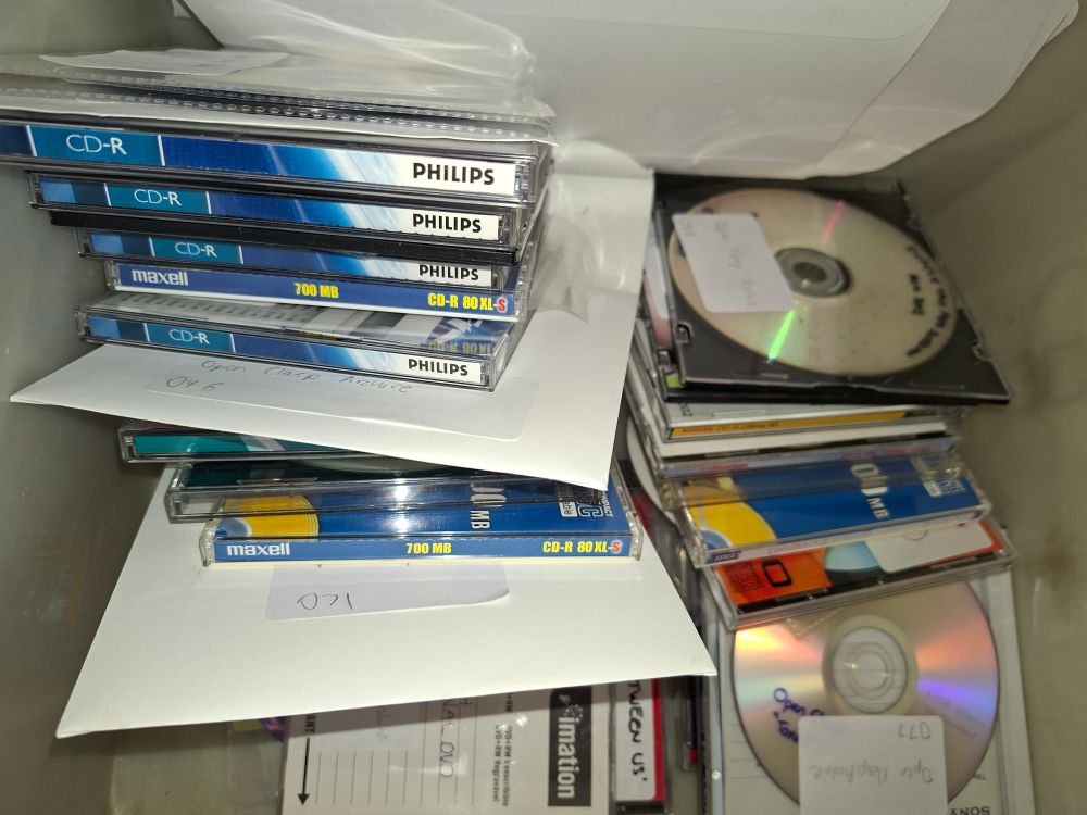 Collection of CDs containing digital data, which needs to be carefully transferred and managed if it is to remain intact and accessible into the the future.