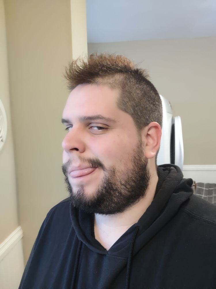 only the head of your eBear Fisher sticking his tongue out. His head is pointed away from the camera.