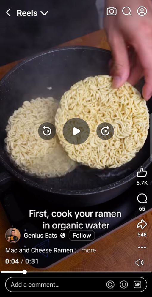 Screenshot of a FB reel of someone adding dry ramen noodles to boiling water with the caption "first, cook your ramen in organic water" 