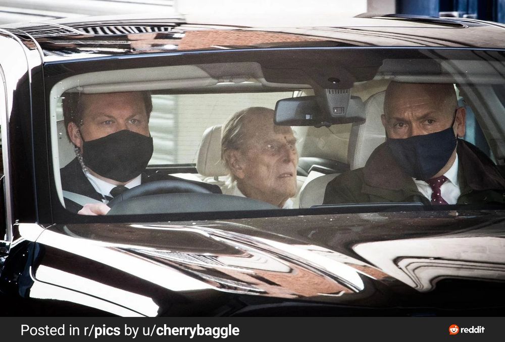 Prince Philip in a car not long before his death, looking like a skeletal spectre 