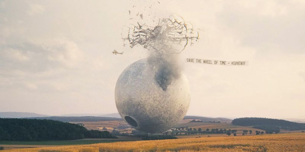 A photoshopped scene from The Wheel of Time episode 304 shows the moment the Sharom explodes after Lanfear drills the Bore into the Dark One’s prison. In the sky above the breaking sphere, a small plane tows a banner that reads “SAVE THE WHEEL OF TIME – #SAVEWOT.”