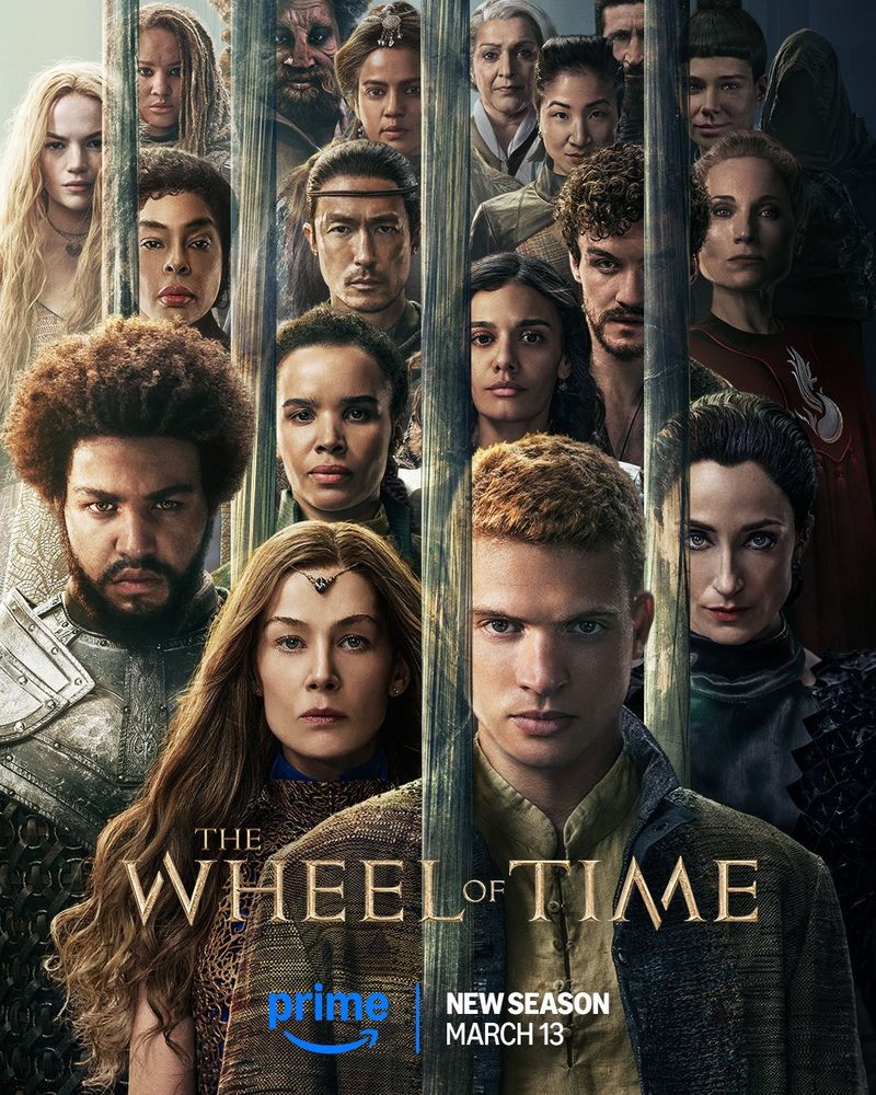 Characters from The Wheel of Time Season 3 are separated by glass columns (including Josha Stradowski as Rand al'Thor, Rosamund Pike as Moiraine Damodred, Marcus Rutherford as Perrin Aybara, Zoë Robins as Nynaeve al'Meara, Natasha O'Keeffe as Lanfear, Madeleine Madden as Egwene al'Vere, Dónal Finn as Mat Cauthon, Kate Fleetwood as Liandrin Guirale, Daniel Henney as al'Lan Mandragoran, Sophie Okonedo as Siuan Sanche, Ceara Coveney as Elayne Trakand, Hammed Animashaun as Loial, Priyanka Bose as Alanna Mosvani, Meera Syal as Verin Mathwin, Kae Alexander as Min Farshaw, Fares Fares as Ishamael, and Laia Costa as Moghedien). The Wheel of Time logo is center, with the Prime Video logo beneath it and text reading: "New Season March 13". 