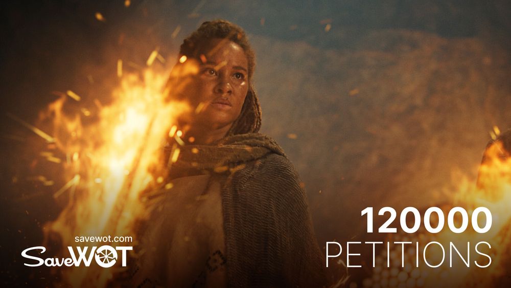 Ayoola Smart as Aviendha from The Wheel of Time holding fire spears made with the One Power
