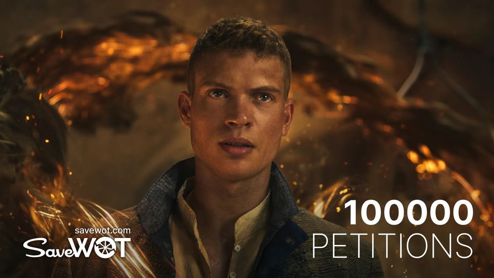 Josha Stradowski as Rand al’Thor stands in front of swirling orange weaves of the One Power, looking determined. Text on the image reads “100000 Petitions” and includes the SaveWOT logo and website URL in the bottom left corner.