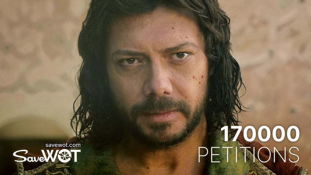 Close-up of Álvaro Morte as Logain Ablar from The Wheel of Time, staring intently with a serious expression. The background is softly blurred, and the text overlay reads “170000 PETITIONS” alongside the SaveWOT logo and website.