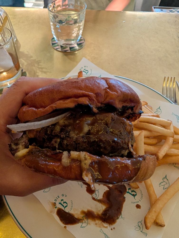 Hamburger dripping with steak sauce