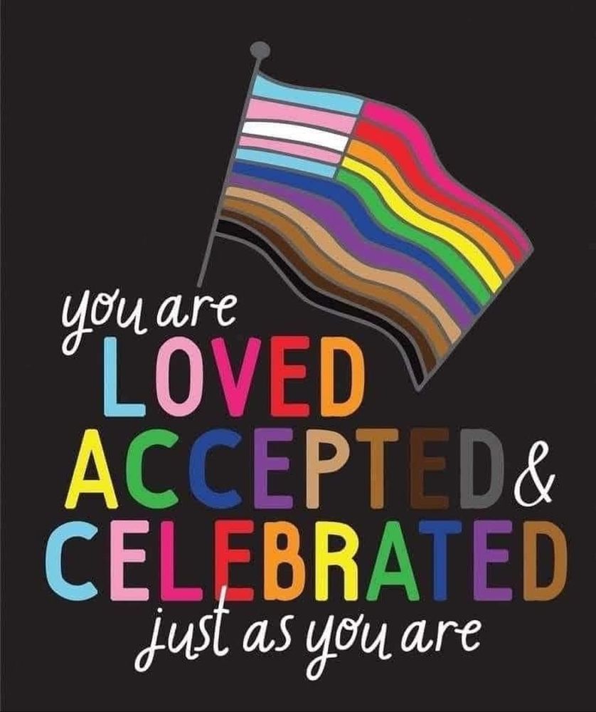 Black background with a Pride flag in the middle of the upper third of the picture. 

Witj words that say "you are loved, accepted and celeejust as you are" 