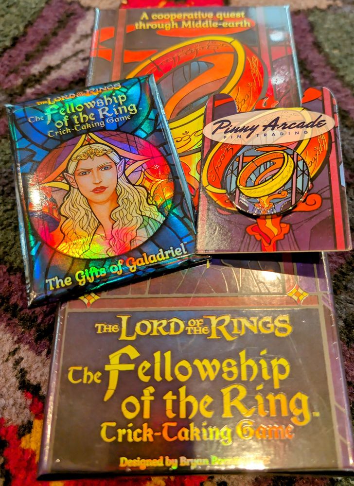Picture of the Lord of the rings trading card game, exclusive Galadriel pack and the limited edition pin