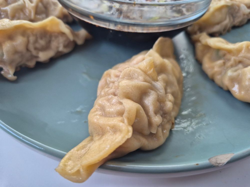 A close up of one of the lumpy dumplings 