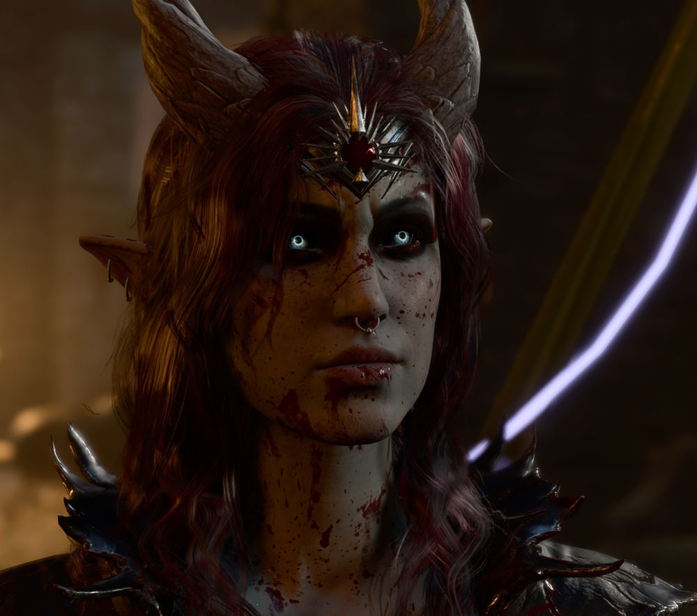 Bust VP portrait of my Dark Urge oc Diss; Fem bodied, pale grey tiefling with black and silver streaked hair put up in a half bun. They got dark circles around their ice blue eyes, with a red crest on the side of them. As well having pierced ears, a septum ring and short twisted horns.
They wear a silvery headband with a red gem, a necklace with crow skulls and bones. As well wearing dark, torn leather plates over their shoulders. They look up with a serious look.