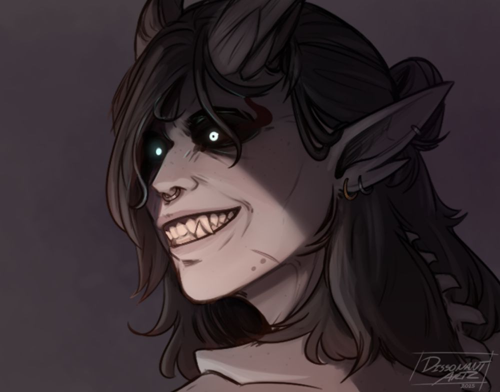 Bust portrait of my Dark Urge oc Diss; Fem bodied, pale grey tiefling with black and silver streaked hair put up in a half bun. They got dark circles around their ice blue eyes, with a red crest on the side of them. As well having pierced ears, a septum ring and short twisted horns.
They look to the side with a huge toothy grin with their eyes wide and piercing. They look rather vile and creepy with the blank glare