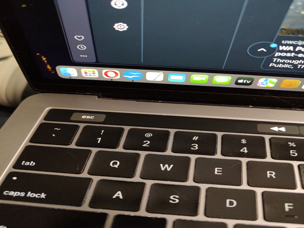 An Apple keyboard with the touch bar instead of tactile buttons, set to have as few of those settings as possible so that I don't keep accidentally activate functions I don't want to use.