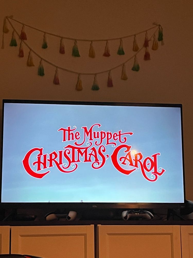 A tv plays Muppet Christmas Carol