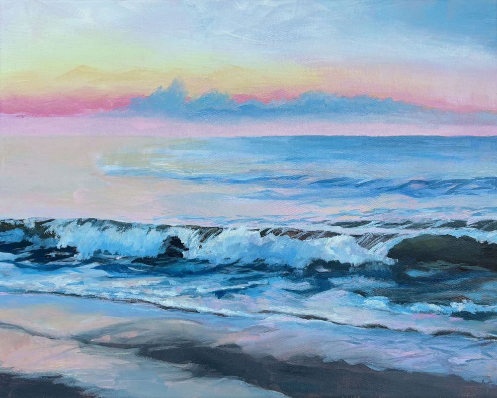 A painting on canvas of a seascape in the early morning at sunrise with soft yellow and pinks in the sky and reflected on the water and wet sand in the foreground while waves gently wash on shore.