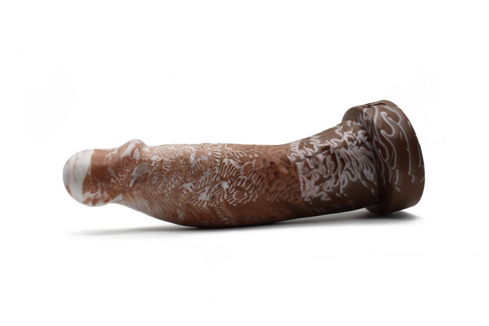 Diedrich pictured from the side, its head angled up higher than the rest of the dildo.