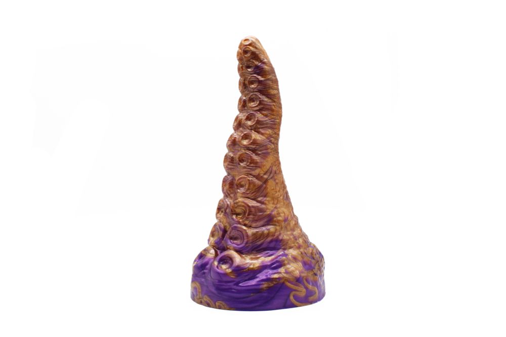 A Big Daddy Davy tentacle standing upright. It's vividly colored with bronze and dark purple pigment.