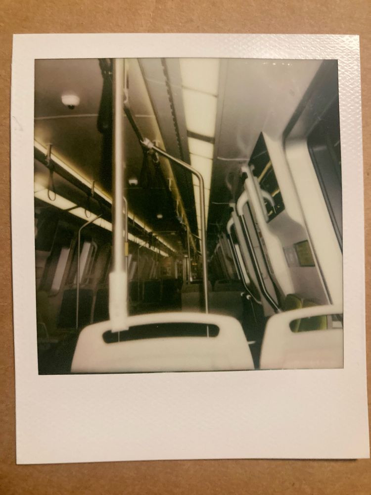 polaroid of an interior of an empty train