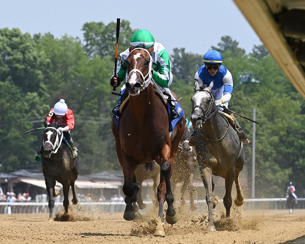 Mythical, bay Florida-bred racehorse, and jockey Emisael Jaramillo, race towards the viewer, outpacing any incoming competition at Saratoga Race Course. The pair, dressed in the green and white silks of Arindel, wired the win, taking the 2025 Tremont (Listed). Mythical is the first filly since Florida-bred Rosie O’Greta in 1995 to win the Tremont. (Photo: ©Adam Coglianese)
