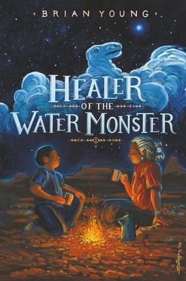 Cover of Healer of the Water Monster. Shows an Indigenous elder and young boy drinking out of mugs in front of a fire in the desert.