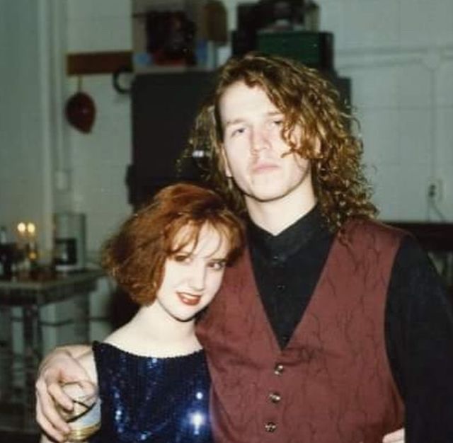 New Year’s Eve 1989 into 1990, at the BrandX Gallery family party. A short 20 year old redhead in a sparkly blue vintage shift dress, and a boy. 