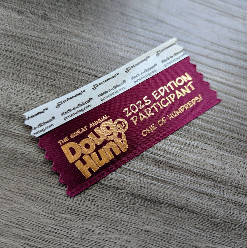 The great annual Doug Hunt 2025 edition participant badge ribbon, one of hundreds!