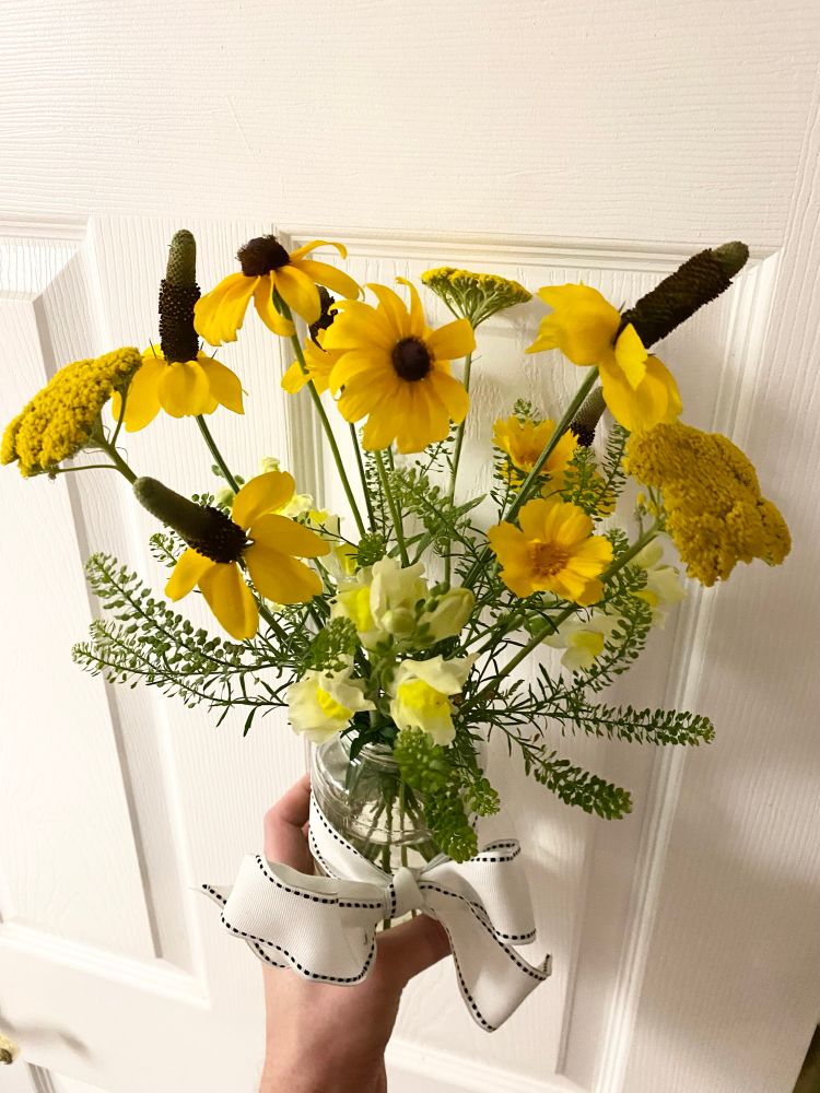 Flower arrangement with snapdragons, yarrow & natives: upright coneflower, coreopsis, orange coneflower