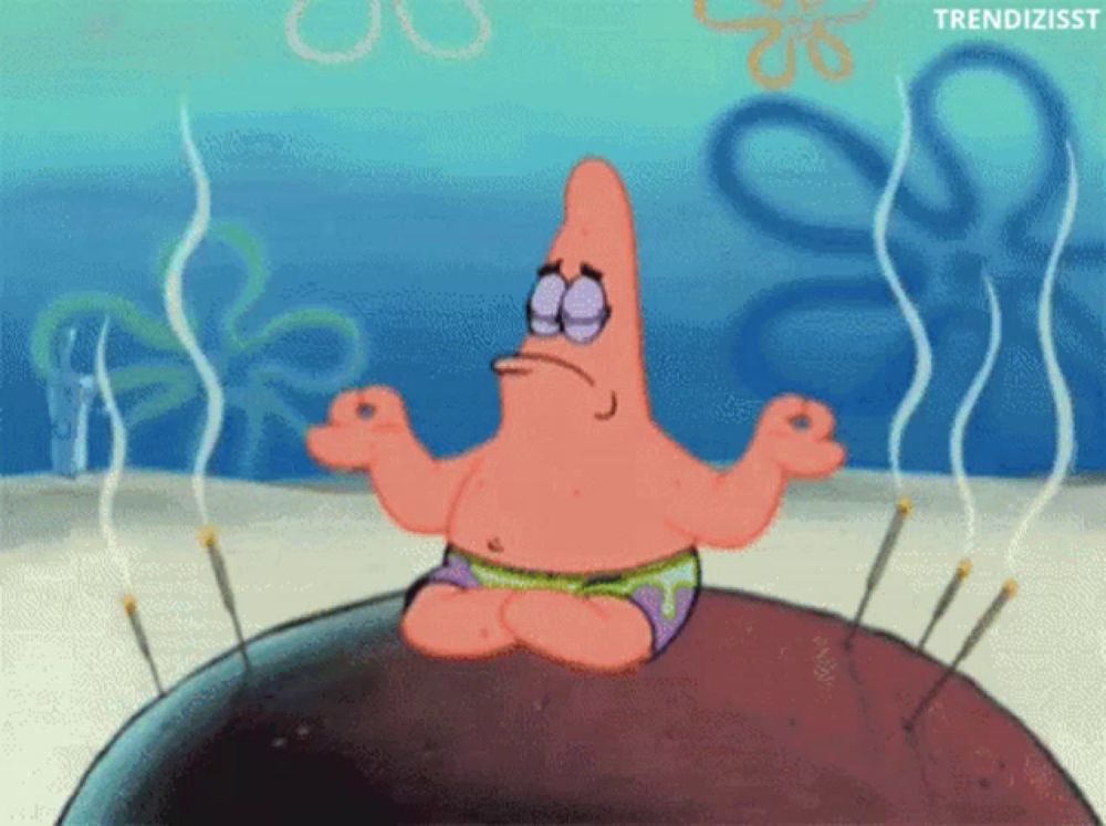 patrick star from spongebob squarepants is meditating on a rock surrounded by needles .