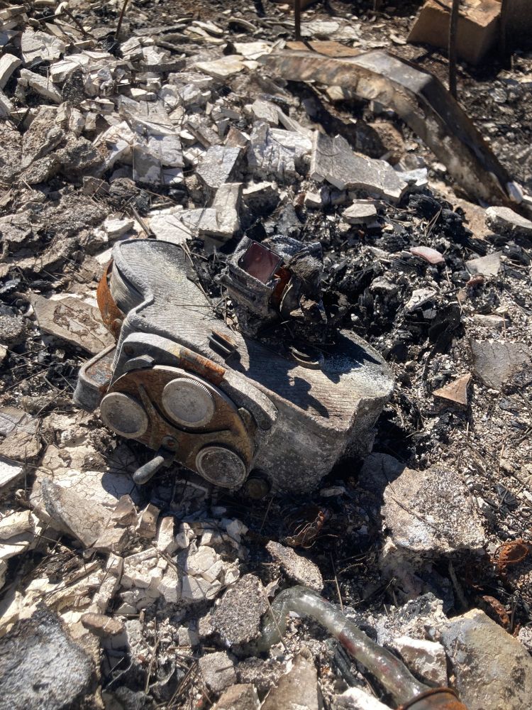 Burned and melted Bolex camera