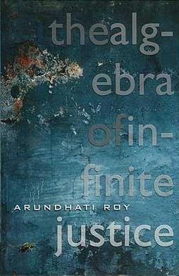 The Alegebra of Infinite Justice by Arundhati Roy.  I am not sure what the cover image is. Perhaps an Abstract painting, perhaps part of an image from the Hubble space telescope, perhaps a photo under an ocean looking up tothe surface. The image conveys a feeling of infinity.
