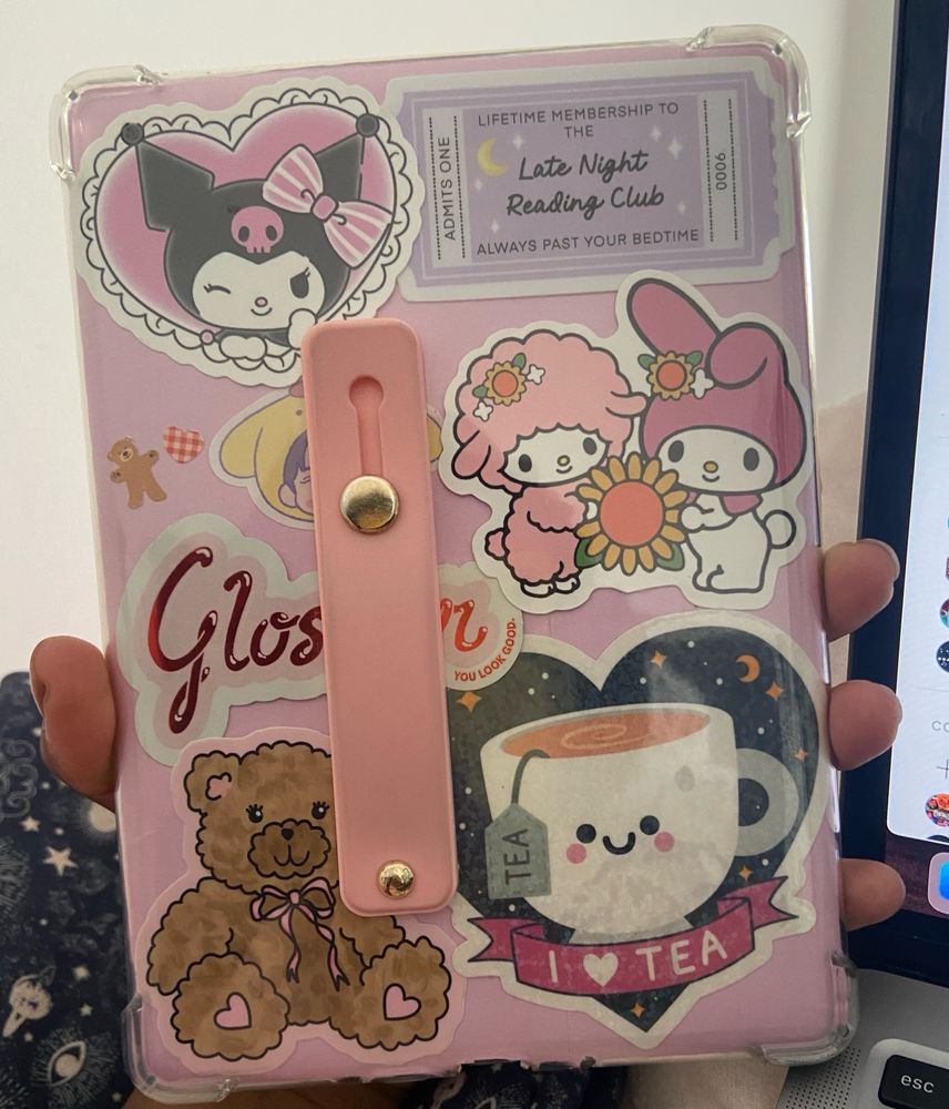 decorated kindle (pink background with a sticker collage)