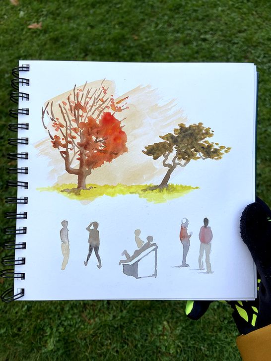 A watercolor sketch page with two trees and some figures done from life.