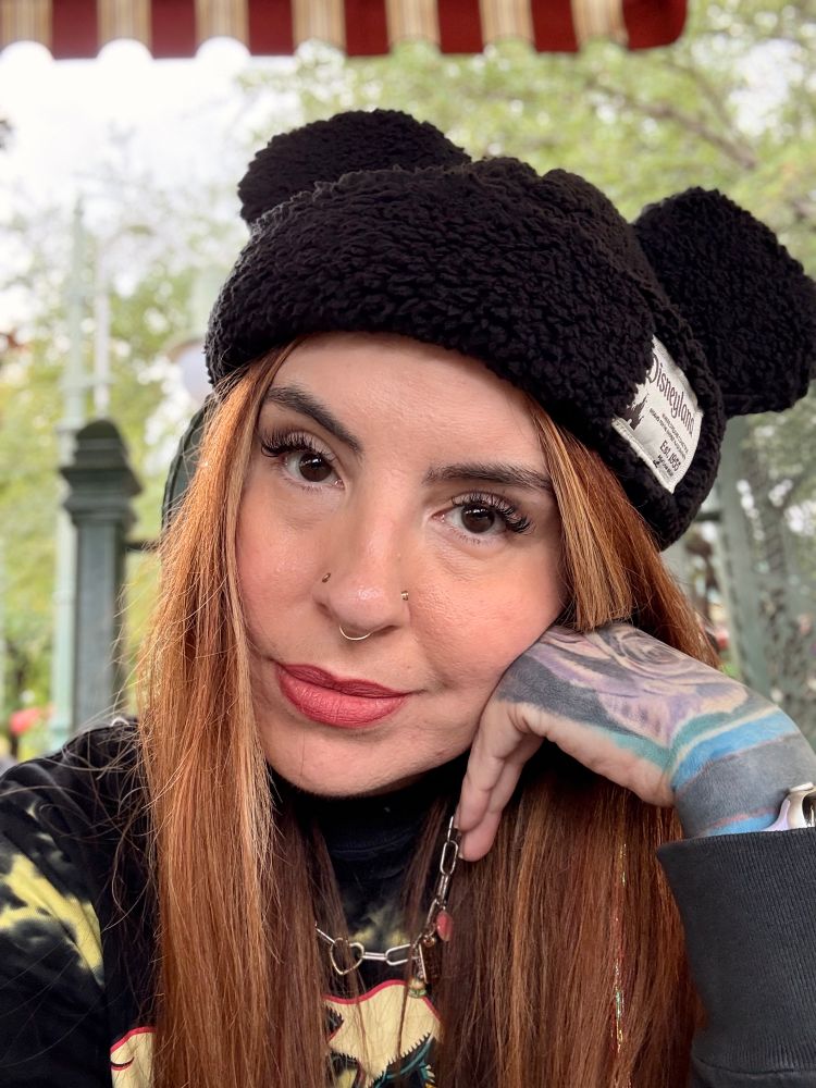 Girl in Mickey beanie enjoying a very rare fall in Southern California 