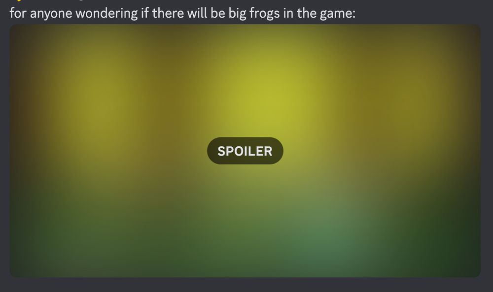 a blurred picture that says SPOILER. Above it says "for anyone wondering if there will be big frogs in the game:"