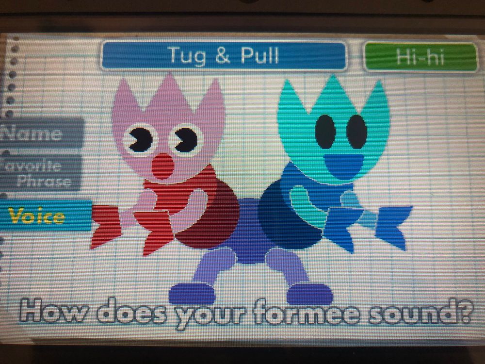 A photo of Freakyforms Deluxe (3DS, 2011), showing a red-and-blue caterpillar-like creature a head on each end.