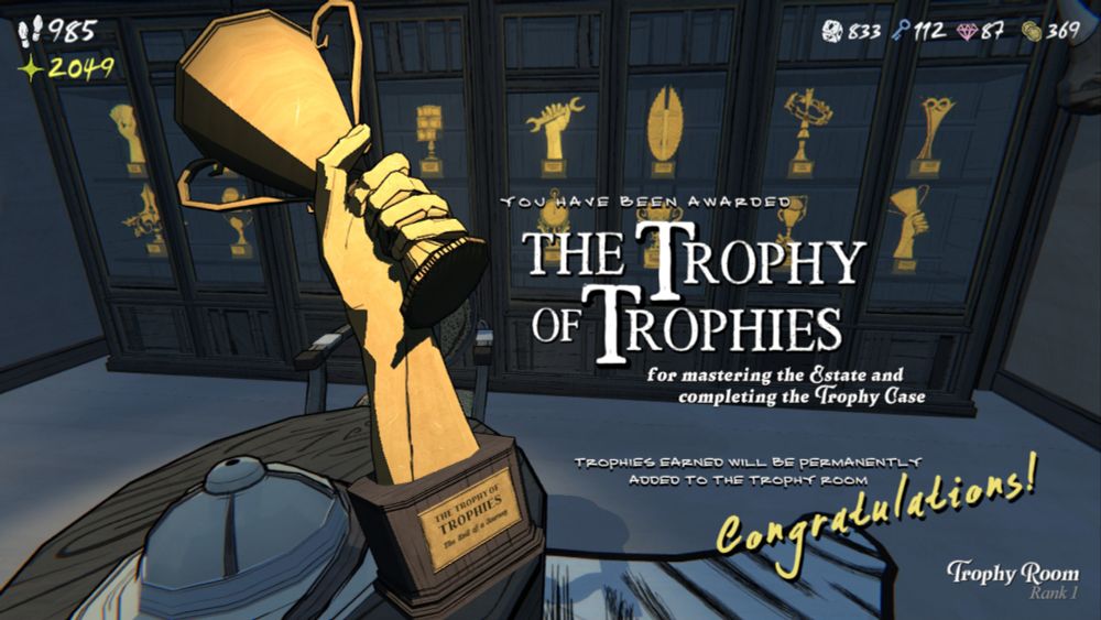 A screenshot from Blue Prince of the Trophy Room where all your in-game trophies/achievements are displayed.  A trophy depicting an arm holding up a second smaller standard-looking trophy is in the foreground and a text overlay reads, "You have been awarded the Trophy of Trophies for mastering the Estate and completing the Trophy Case." 