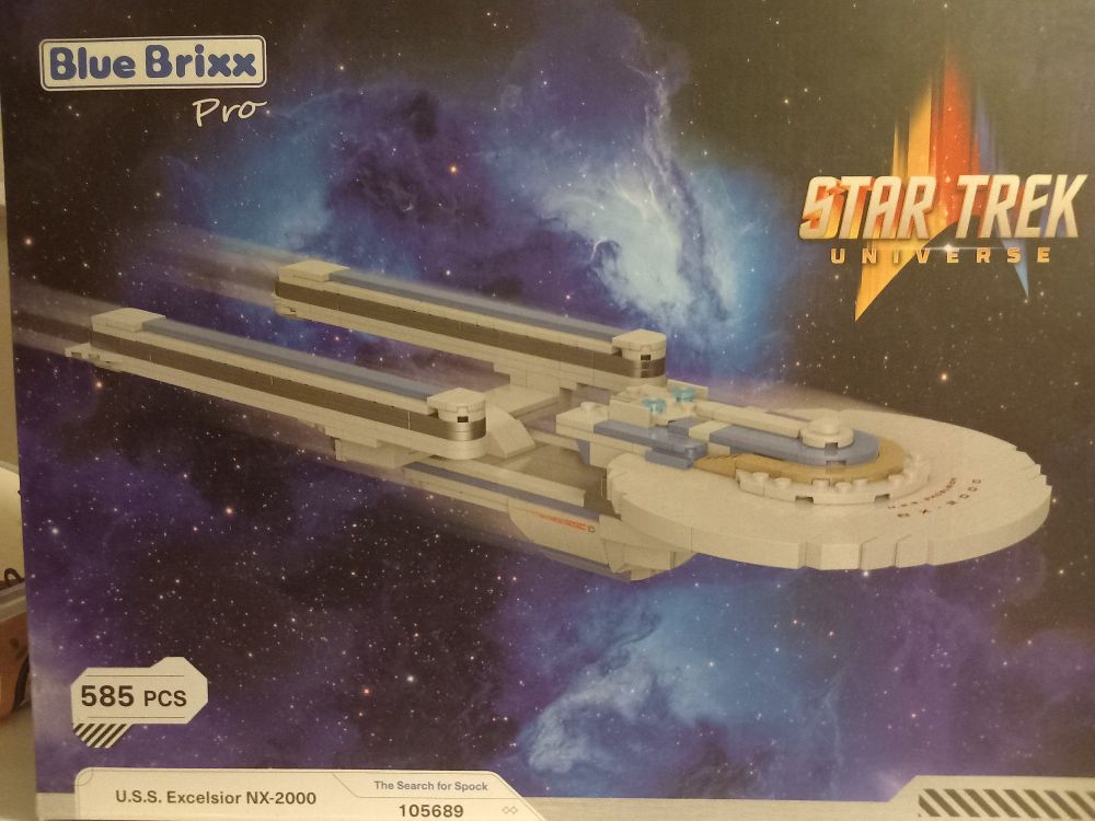 A BlueBrixx Pro box that contains 585 pieces to build a model of the USS Excelsior NX 2000.
