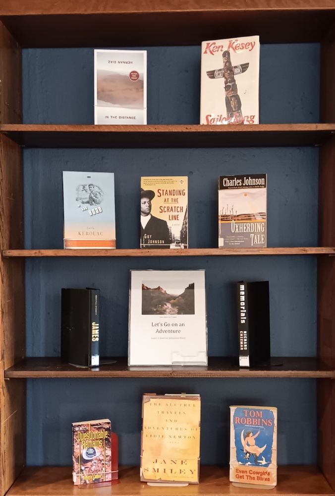 Book display featuring In the Distance; Sailor Song; On the Road; Standing at the Scratch Line; Oxherding Tale; James; Memorials; Questionable Remains; The All True Travels and Adventures of Lidie Newton; and Even Cowgirls Get the Blues