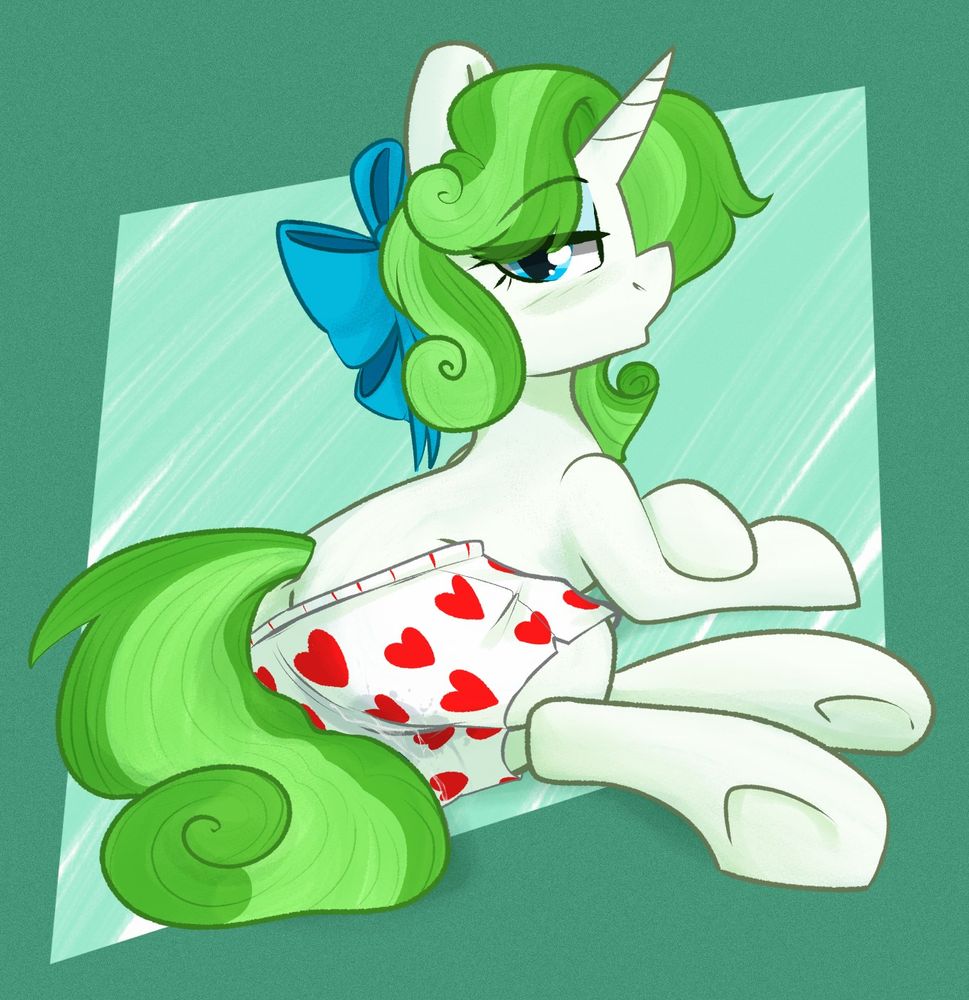 Pony Minty Quill with her curly mane, she is laying on the side with her front legs crossed. She has bedroom eyes and is turned to the viewer.
She is wearing a pair of heart print boxers, very slightly pulled down. Her underwear is stained by cum.