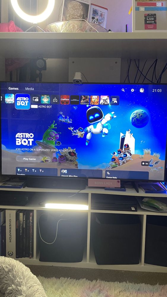 Tv depicting starting screen of game Astrobot 
