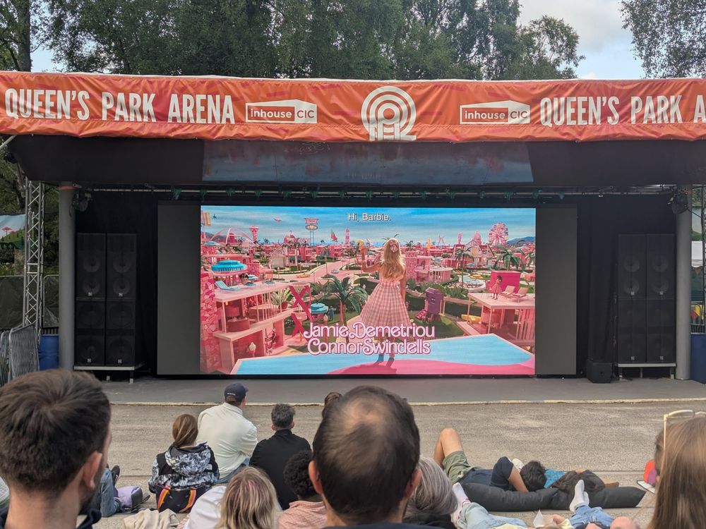 A screenshot of an outdoor showing of the Barbie movie
