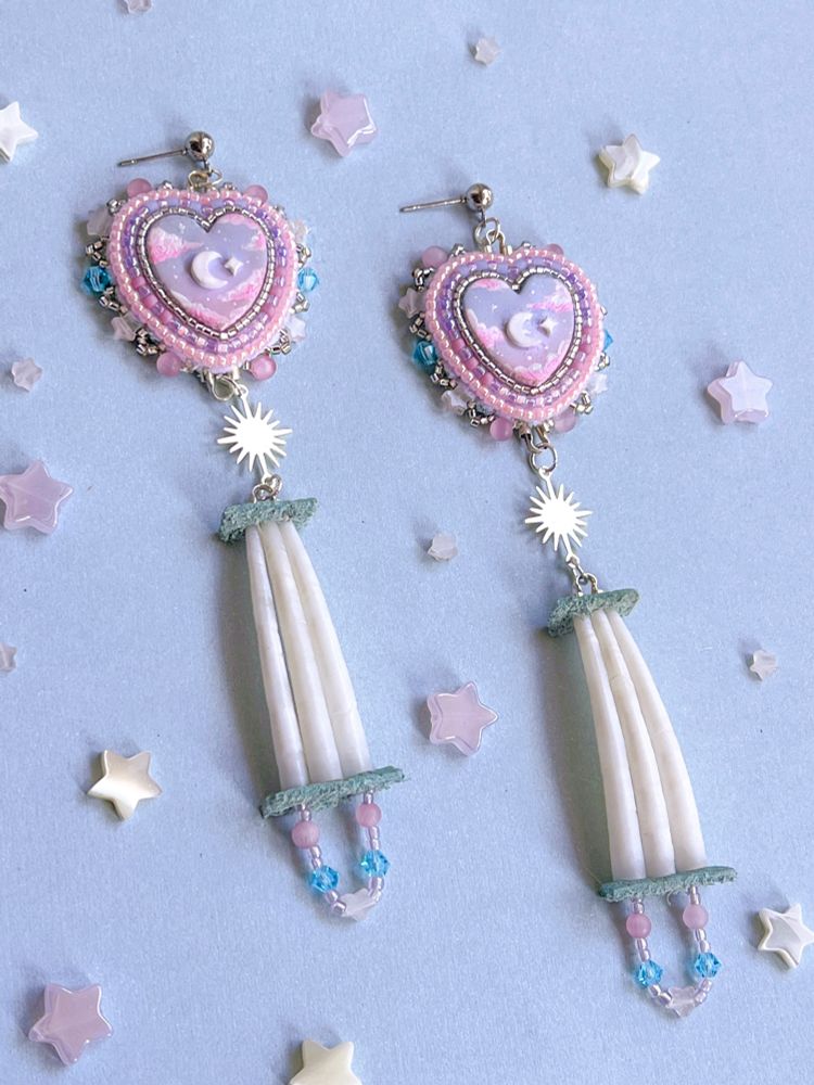heart-shaped blue, purple, and pink beaded earrings with dentalium shells