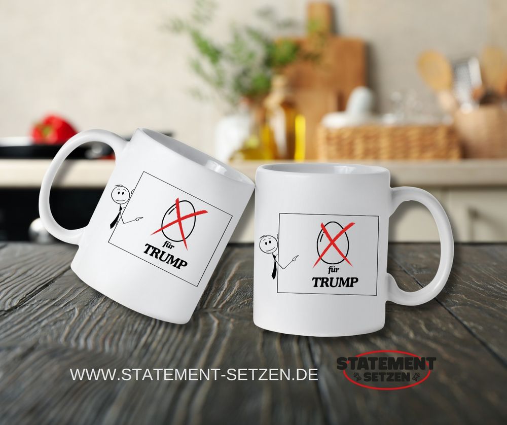 2 Kaffebecher mit Motiv: Strichmännchen zeigt auf durch gestrichenes Ei Tex: für Trump Also kein Ei für Trump 