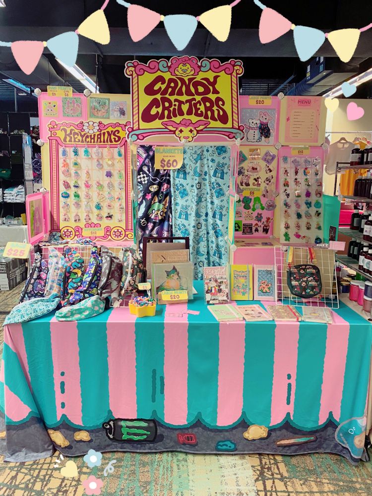 a very colorful carnival themed artist table