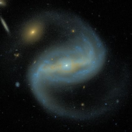 A barred spiral galaxy, possibly merging from the Galaxy Zoo: Hubble project, classified by 47 volunteers.