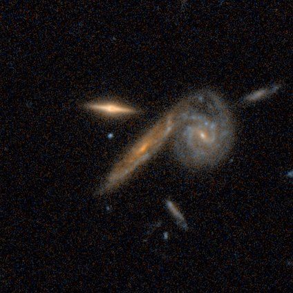 A spiral galaxy in a merger from the Galaxy Zoo: Hubble project, classified by 28 volunteers.