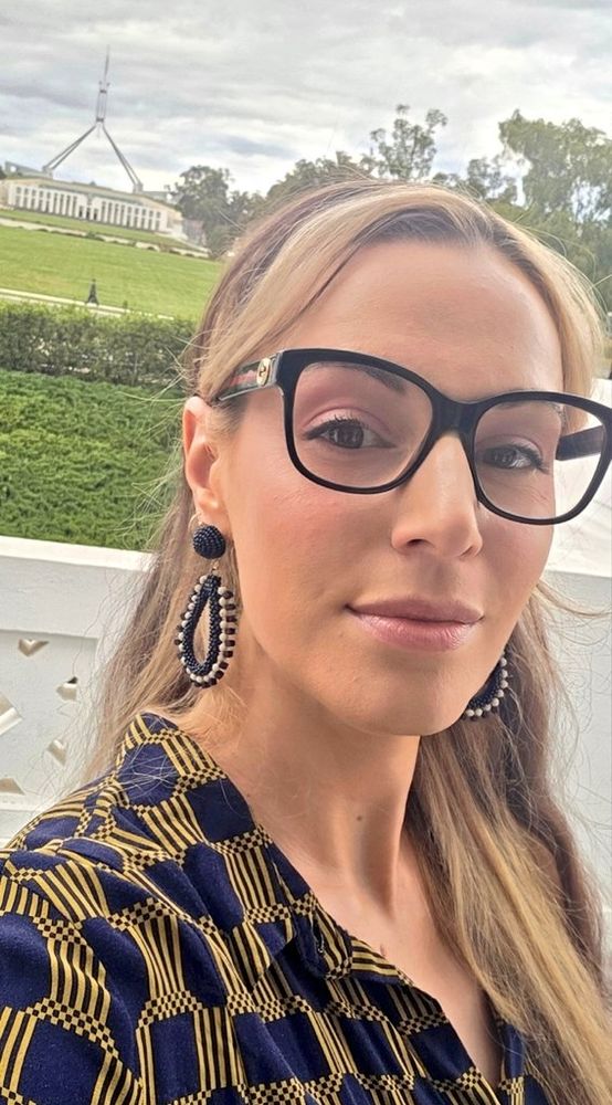 my face (large) Parliament House (small)