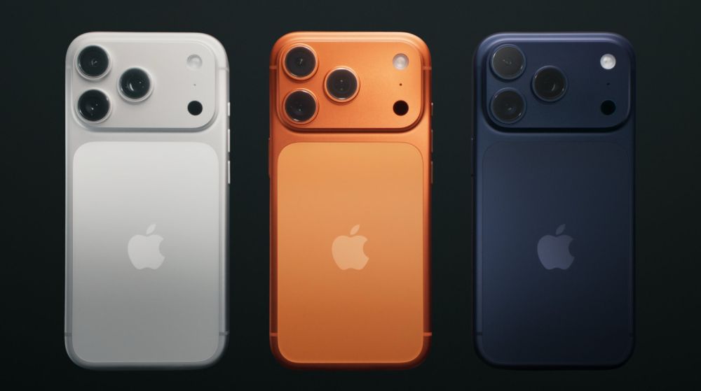Marketing photo showing three colors of the new iphone 17 - gray, orange, and black. 