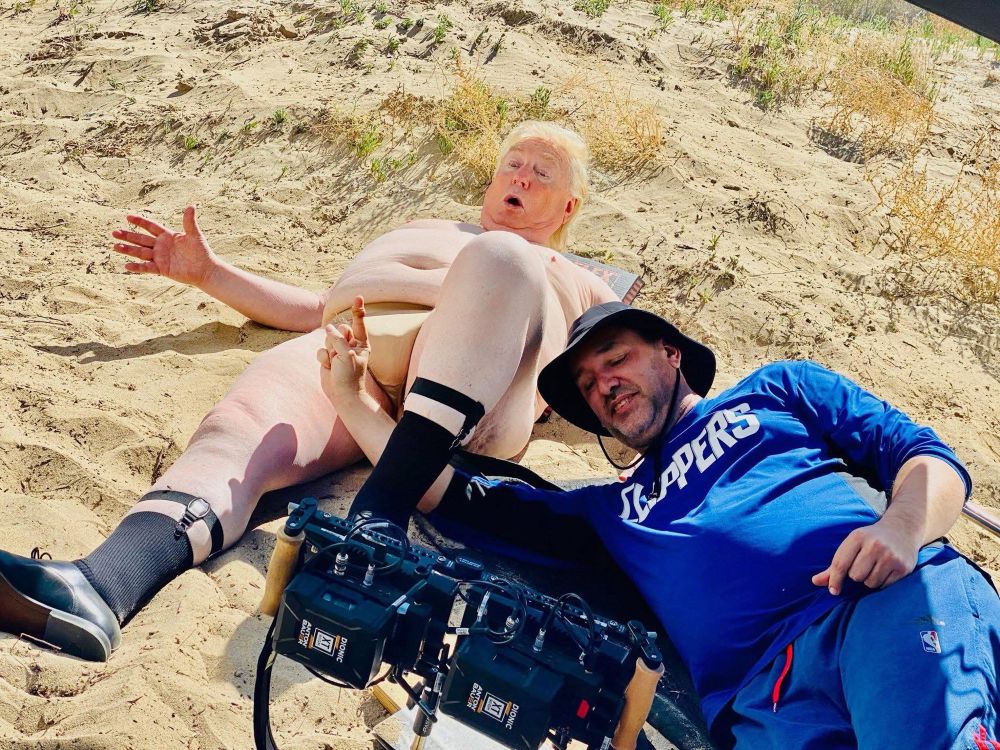 BTS of a film shoot: a trump body double, naked, and a filmmaker with a penis finger puppet composing the shot. 

I can’t believe I just had to write that. 